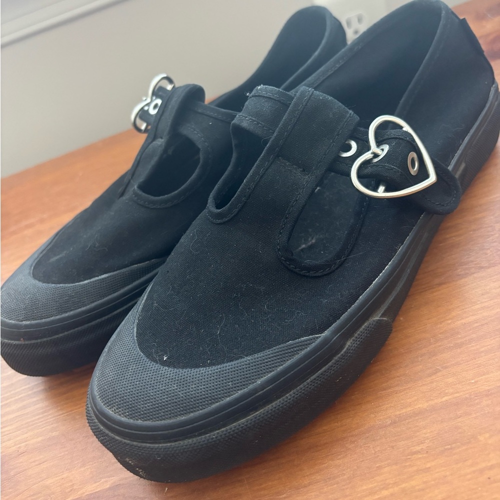 Black Van’s, 90’s Style slip-ons with adjustable buckle, size 9